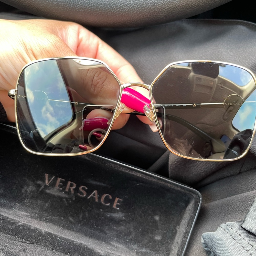 Versace Ladies authentic sunglasses in gold and black